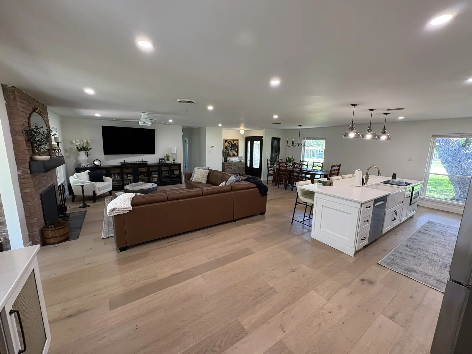 Open plan kitchen and living room in a Hollywood Park whole home remodel